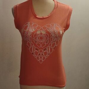 Almost Famous Coral colored top, with peekaboo cutouts, Size S‎
